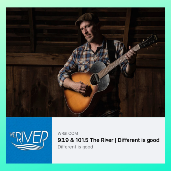 Full color image (framed in sea green) of Peter Mulvey playing his guitar on stage. He wears a blue/red plaid button down shirt and a brown hat. He looks down & to his right. Below, The River logo, text reads: "93.9 & 101.5 The River | Different is Good"