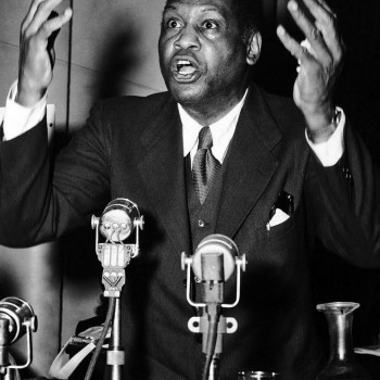 U.S. singer Paul Robeson gestures during his speech at the World Peace Conference held on April 20, 1949 at the Pleyel Hall in Paris, France. 