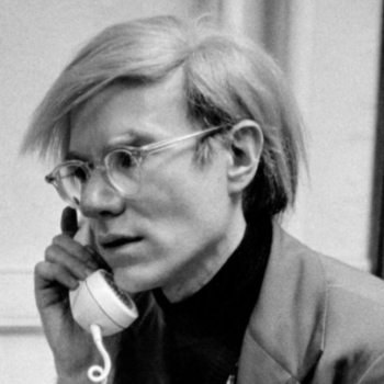 Andy Warhol, speaking into a telephone