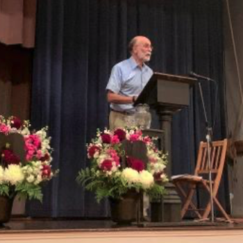 Robert Meeropol speaking at the podium