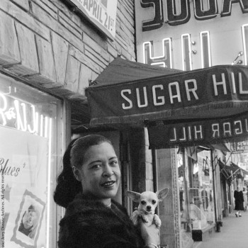 Billie Holiday holding her pet Chihuahua Pepi in front of Sugar Hill Newark New Jersey April 18, 1957 (grayscale)